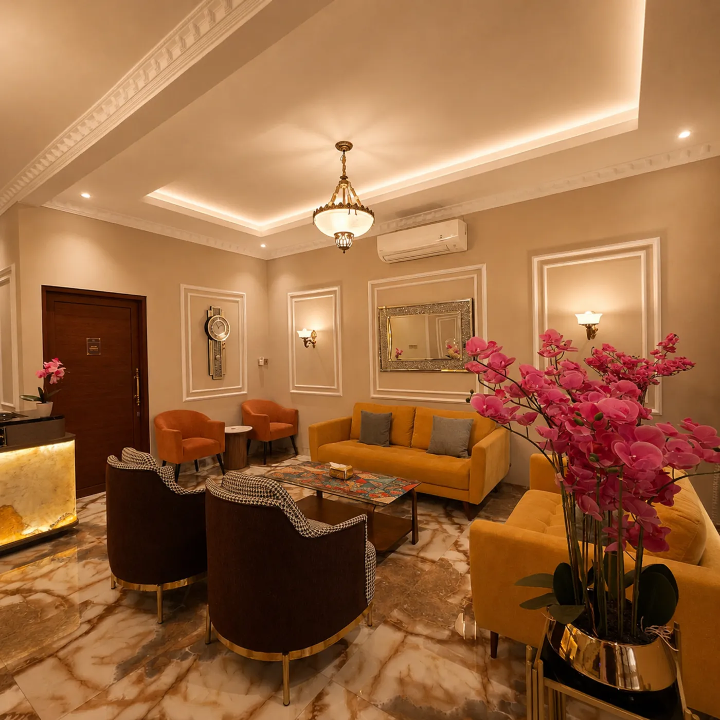 Ruang tunggu ME Clinic dengan sofa dan anggrek